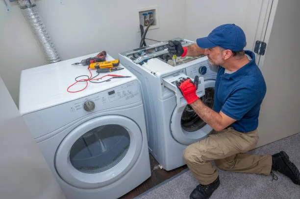 Independent appliance service professional inspecting residential laundry equipment